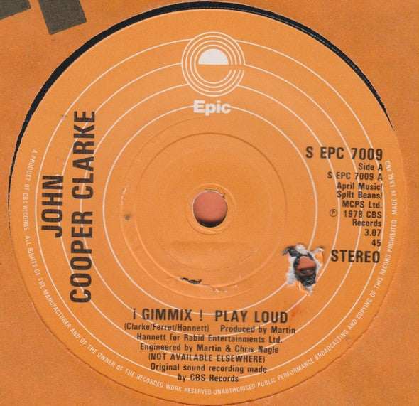 John Cooper Clarke : ¡ Gimmix ! Play Loud (7", Single)