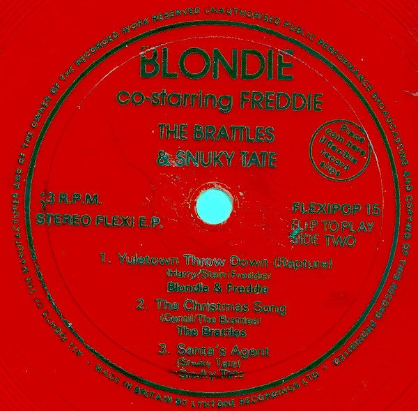 Blondie And Fab 5 Freddy / The Brattles / Snuky Tate : Yuletown Throw Down (Rapture) / The Christmas Song / Santa's Agent (Flexi, 7", Red)