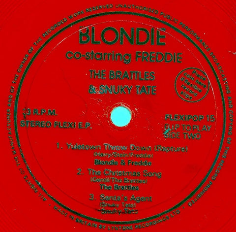 Blondie And Fab 5 Freddy / The Brattles / Snuky Tate : Yuletown Throw Down (Rapture) / The Christmas Song / Santa's Agent (Flexi, 7", Red)